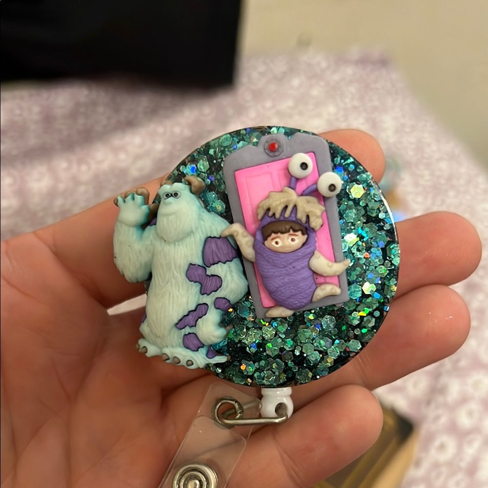Handmade monsters Inc glittery badge reel bought on Etsy new never used.